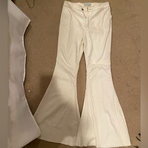 cream colored flare jeans